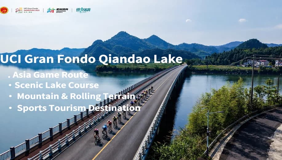 Cyclists on scenic bridge at UCI Gran Fondo Qiandao Lake